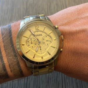 Fossil gold colored watch.